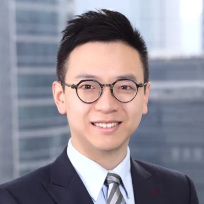 邹镇隆，通商律师事务所与周俊轩律师事务所联营（通商香港）
